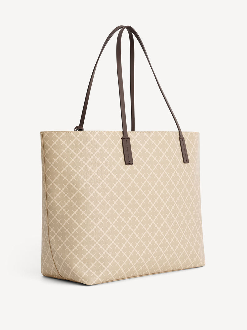 By Malene Birger Abi Tote veske i beige Signature Flower-print, med skinndetaljer og romslig design.