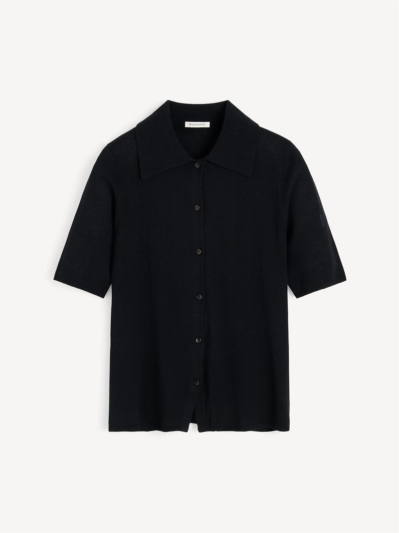 By Malene Birger Dotta bluse i sort, med krage og knapper, laget av en blanding av lyocell, ull og silke.