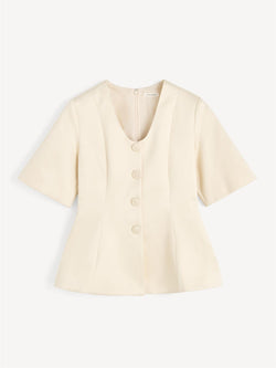 By Malene Birger Merlina bluse i svart, med v-utringning og innsvinget midje, laget av polyester og bomull.