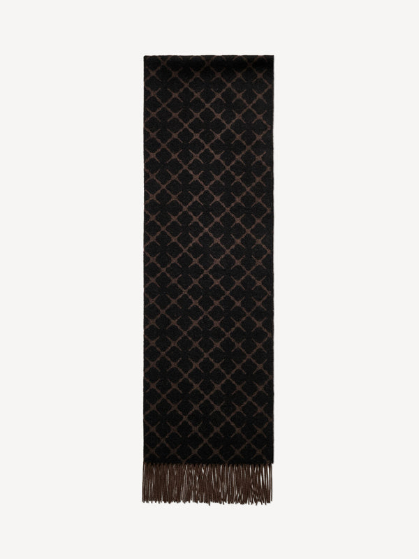 By Malene Birger Ortega skjerf i brun, vevd med Signature Flower-print, laget av en blanding av ull og kasjmir.